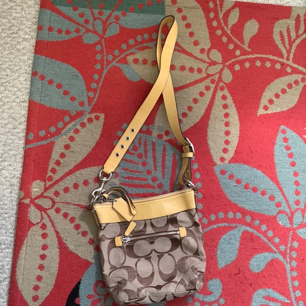 Beautiful authentic coach crossbody bag hardly used.  No rips, tears or stains.